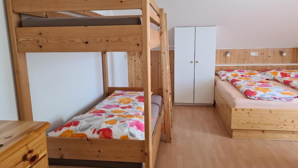 Postel nebo postele na pokoji v ubytování Frühstückspension Täuber