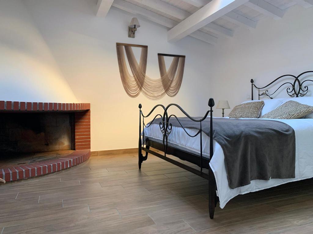 Posteľ alebo postele v izbe v ubytovaní ComfortHouse Ladispoli