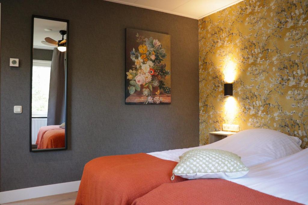 Postel nebo postele na pokoji v ubytování Hotel Jans