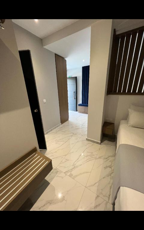 Posteľ alebo postele v izbe v ubytovaní V luxury Suites