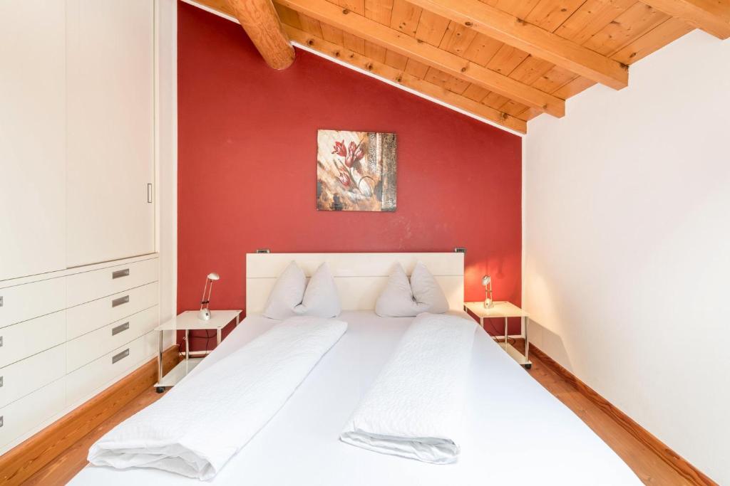 Łóżko lub łóżka w pokoju w obiekcie Casa Rustico