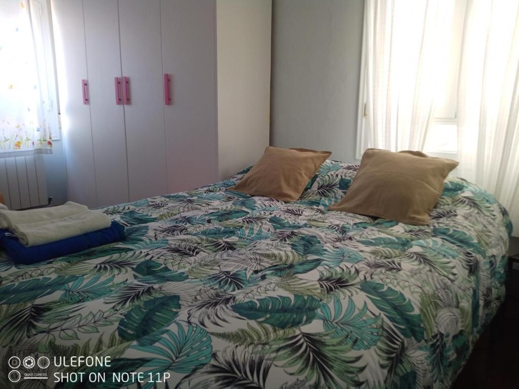 Posteľ alebo postele v izbe v ubytovaní Apartamento Portugalete