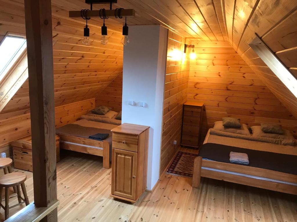 Postel nebo postele na pokoji v ubytování Miodunka1