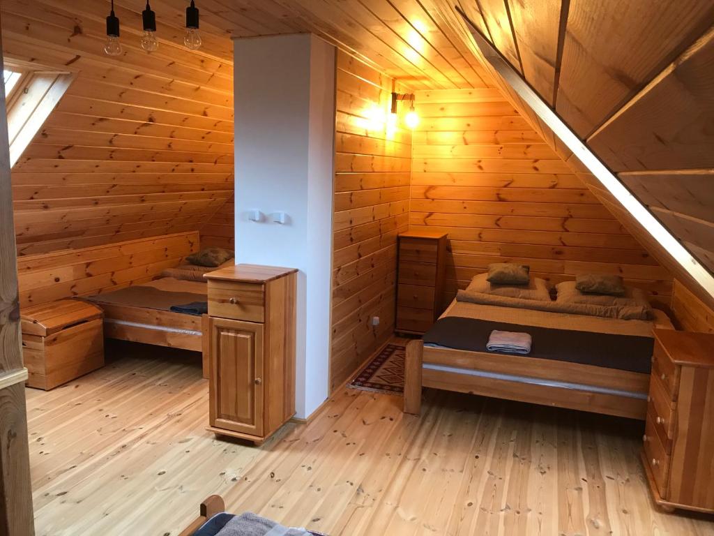 Postel nebo postele na pokoji v ubytování Miodunka1