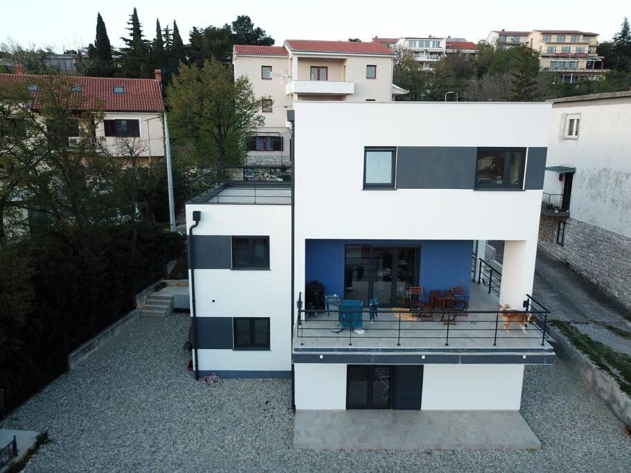 an aerial view of a white building at Apartment in an urban villa Kraljevica in Kraljevica