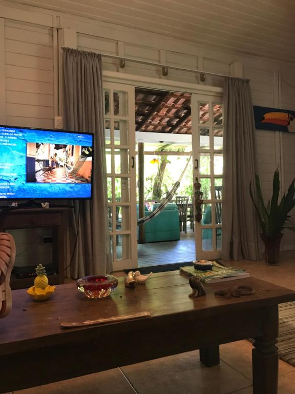 TV a/nebo společenská místnost v ubytování Pousada das Gêmeas