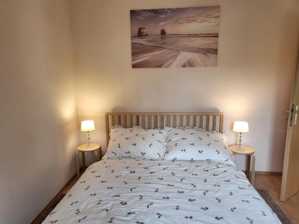 Postel nebo postele na pokoji v ubytování Graz Liebenau