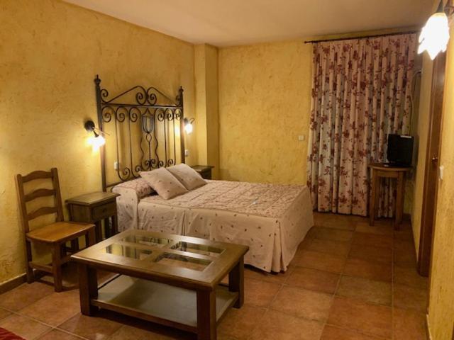 Postel nebo postele na pokoji v ubytování Hotel Langa