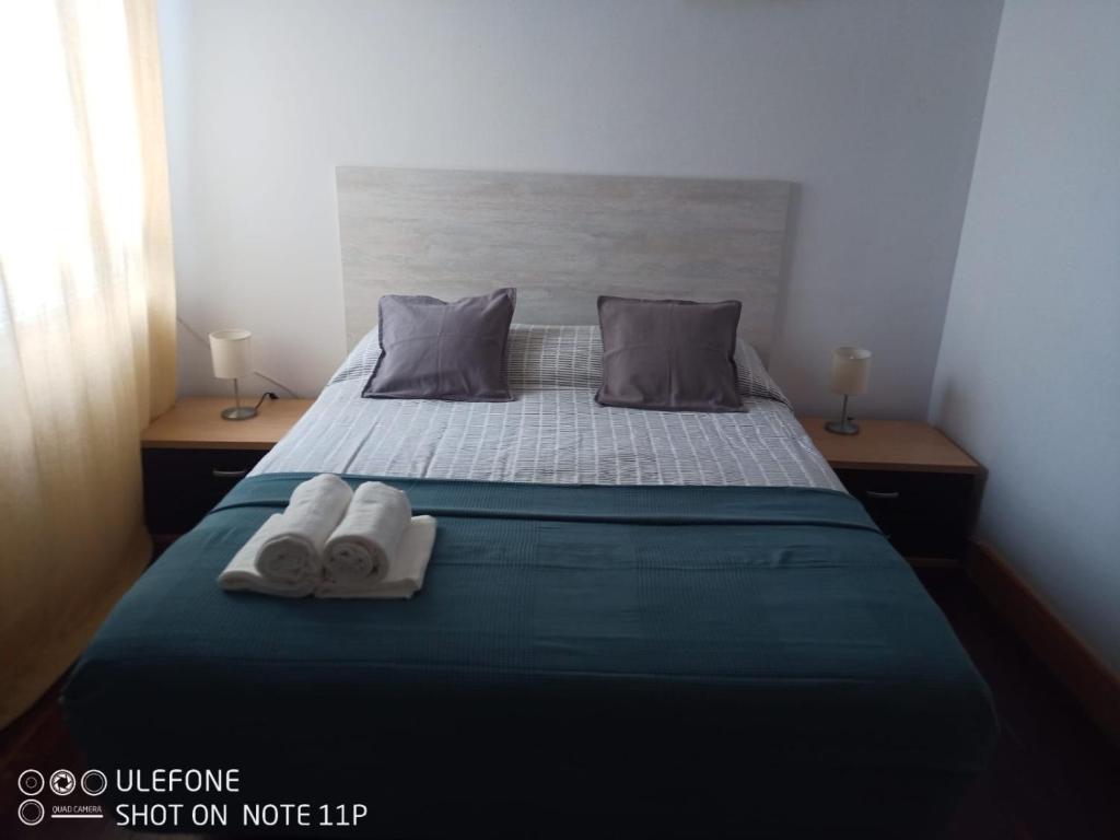 Posteľ alebo postele v izbe v ubytovaní Apartamento Portugalete