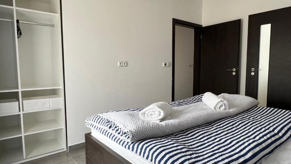 Postel nebo postele na pokoji v ubytování Apartmán D5 Nová Pec