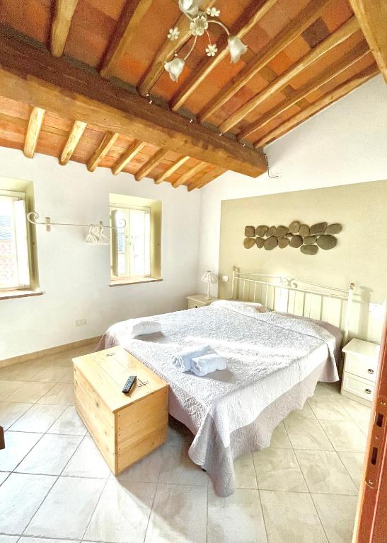 Postel nebo postele na pokoji v ubytování B&B Alloro