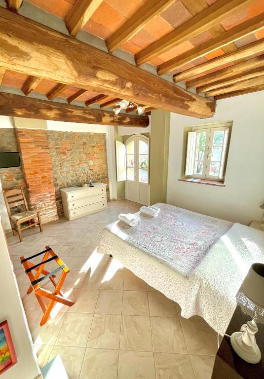 Postel nebo postele na pokoji v ubytování B&B Alloro