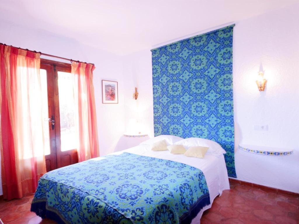 Postel nebo postele na pokoji v ubytování Villas PERRET