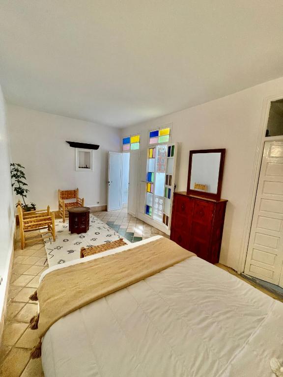 Postel nebo postele na pokoji v ubytování Riad Dar Zayna
