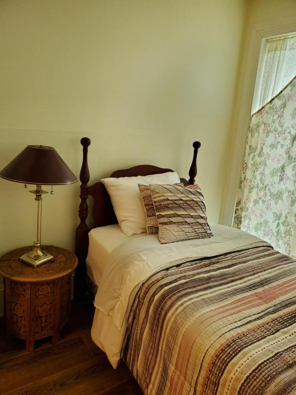 Postel nebo postele na pokoji v ubytování Rothesay Motel