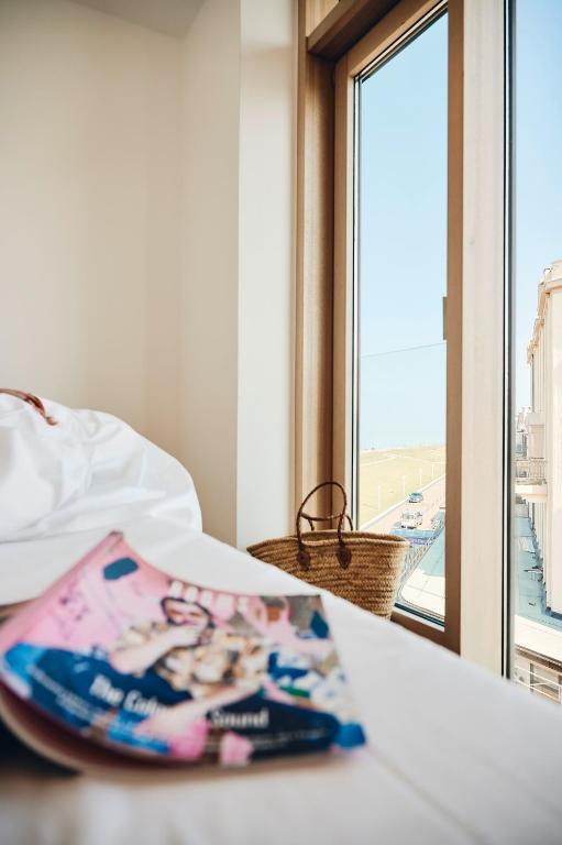 Postel nebo postele na pokoji v ubytování Hotel Haus am Meer