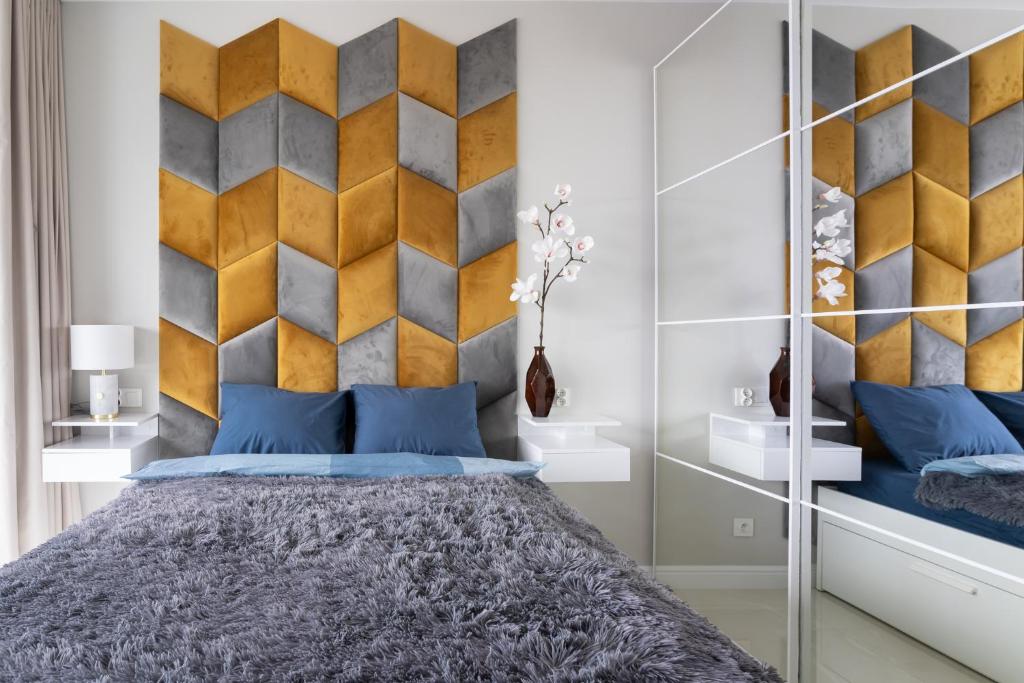 Posteľ alebo postele v izbe v ubytovaní Apartament 1612 Modern Tower Gdynia