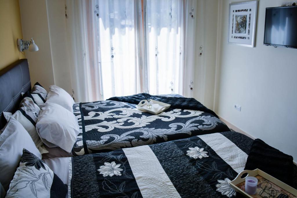 Postel nebo postele na pokoji v ubytování El Tossal