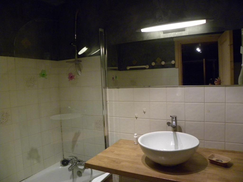 a bathroom with a bowl sink and a shower at LA CORDEE in Valloire