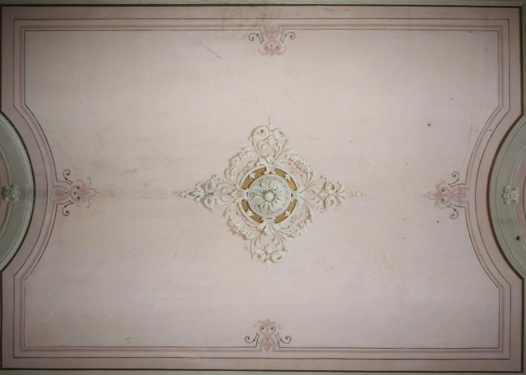 a white ceiling with a flower design on it at Resort CostantiNapoli 27 in Naples