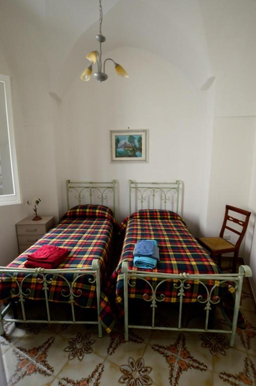 Łóżko lub łóżka w pokoju w obiekcie Gabriele-Apartment