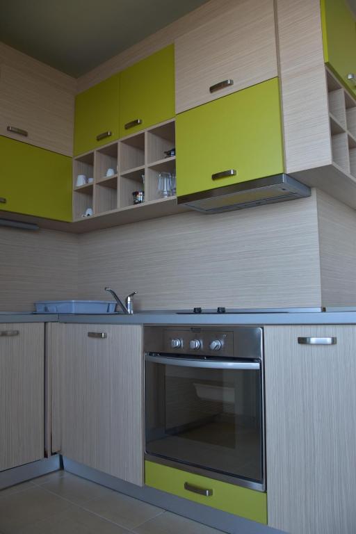 Kuchyň nebo kuchyňský kout v ubytování Brezza Marina House
