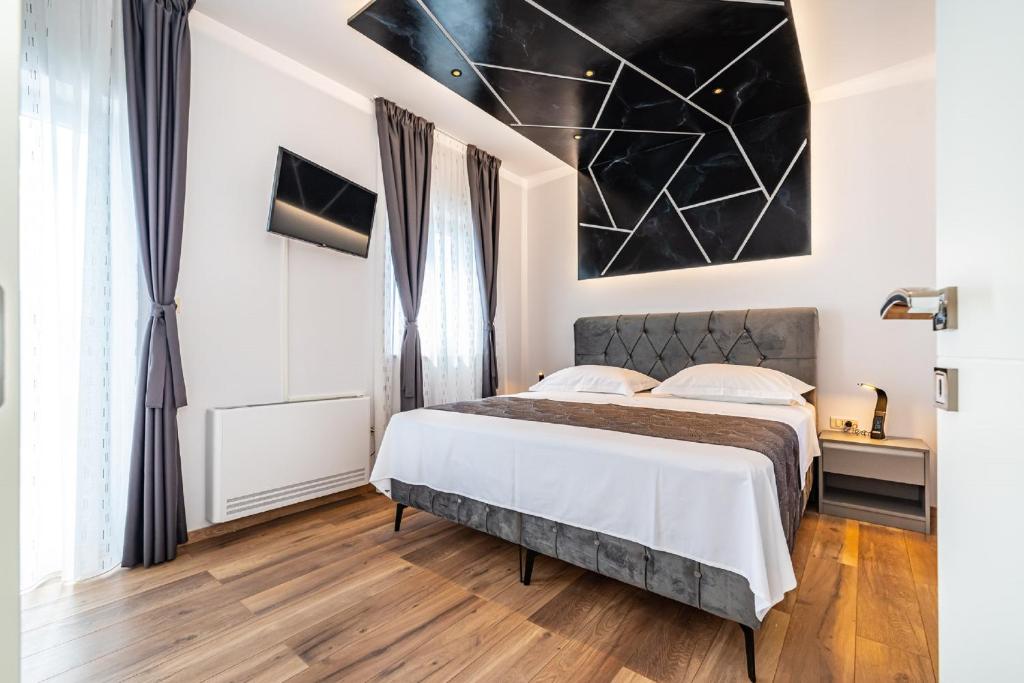 Posteľ alebo postele v izbe v ubytovaní Villa Bocagnazzo