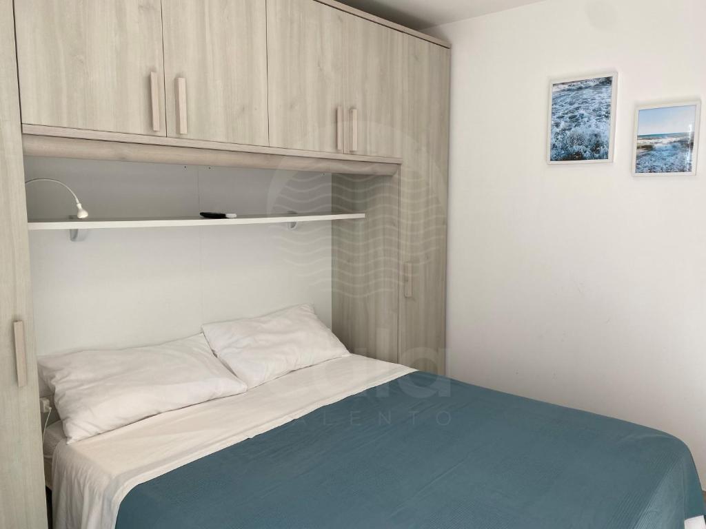 Postel nebo postele na pokoji v ubytování Villa Grace By Cala Salento