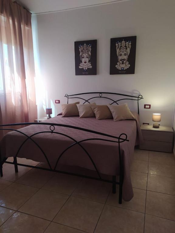 Postel nebo postele na pokoji v ubytování Poesia del Mare B&B