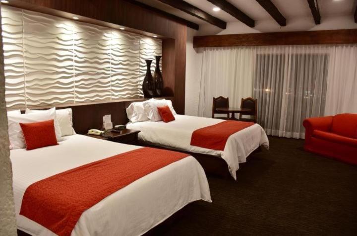 Postel nebo postele na pokoji v ubytování Radisson Hotel Tapatio Guadalajara Aeropuerto