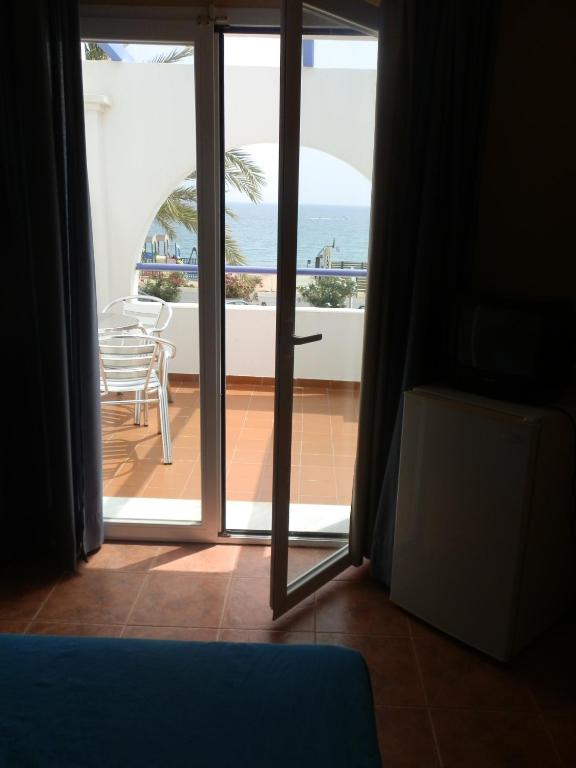 Postel nebo postele na pokoji v ubytování Hotel Mojácar Playa