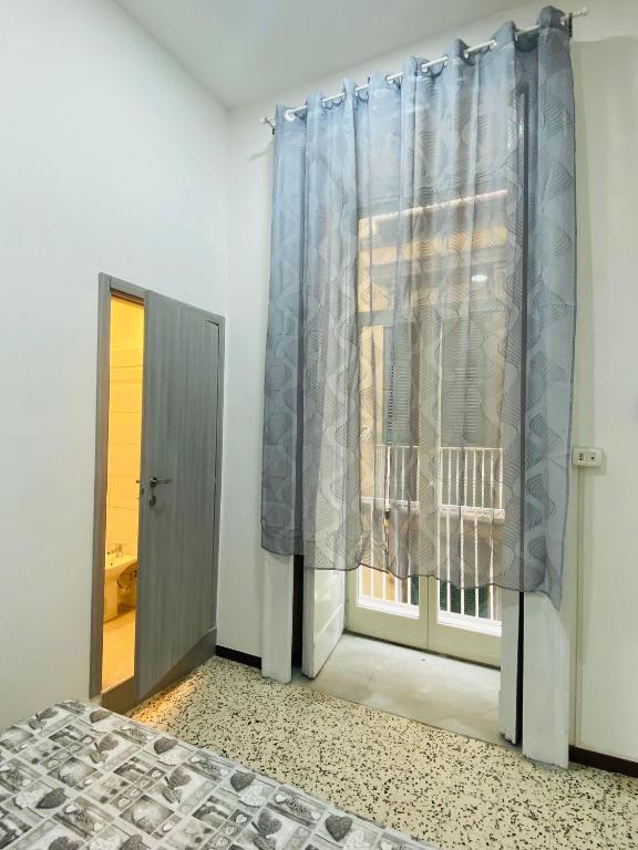 Posteľ alebo postele v izbe v ubytovaní Nel cuore Di Napoli