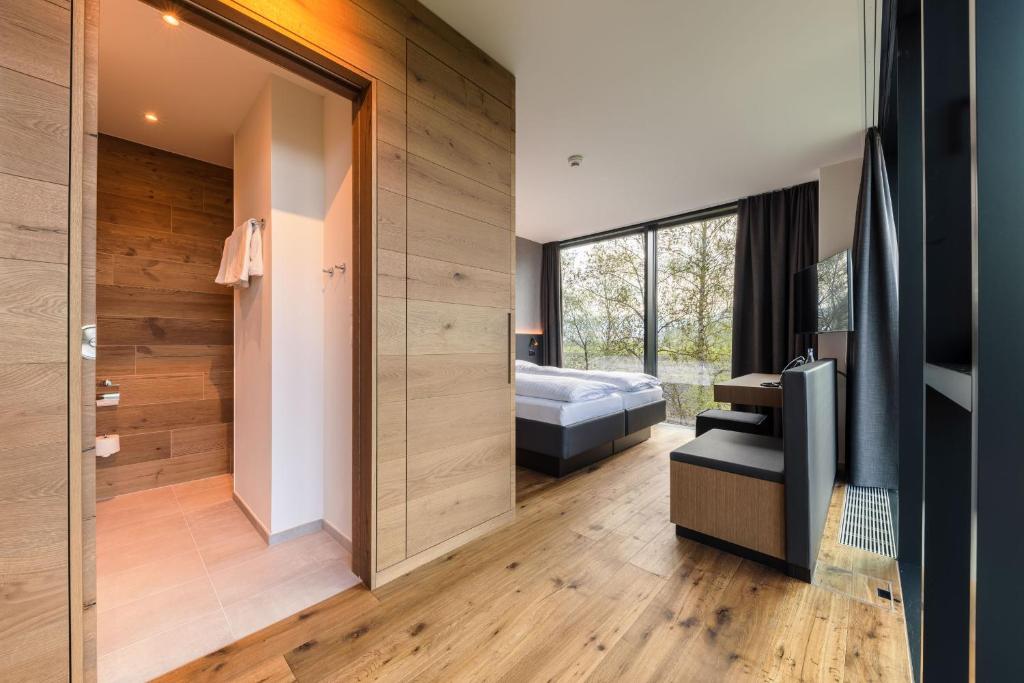 Postel nebo postele na pokoji v ubytování Hotel kommod