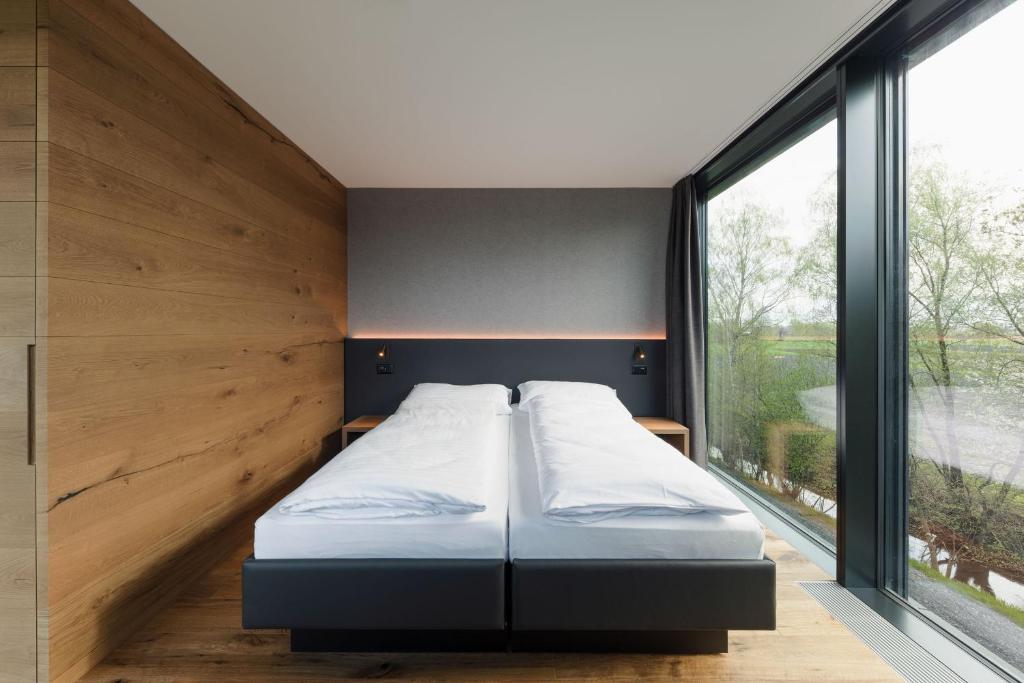 Postel nebo postele na pokoji v ubytování Hotel kommod