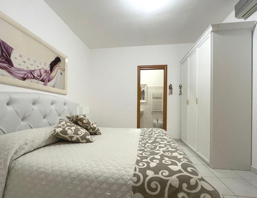 Postel nebo postele na pokoji v ubytování Bella Matera