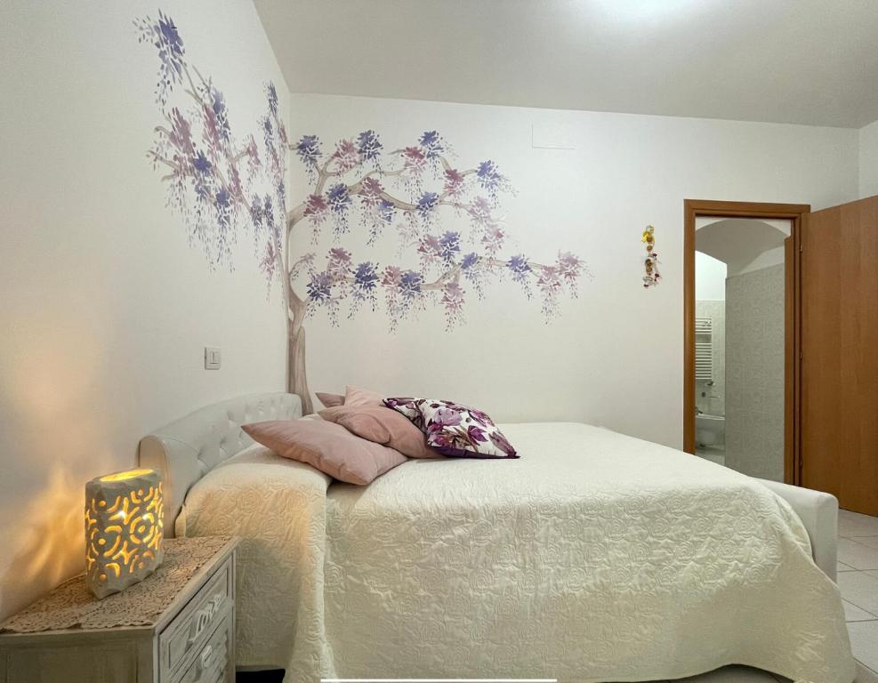 Postel nebo postele na pokoji v ubytování Bella Matera