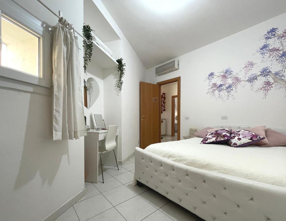 Postel nebo postele na pokoji v ubytování Bella Matera