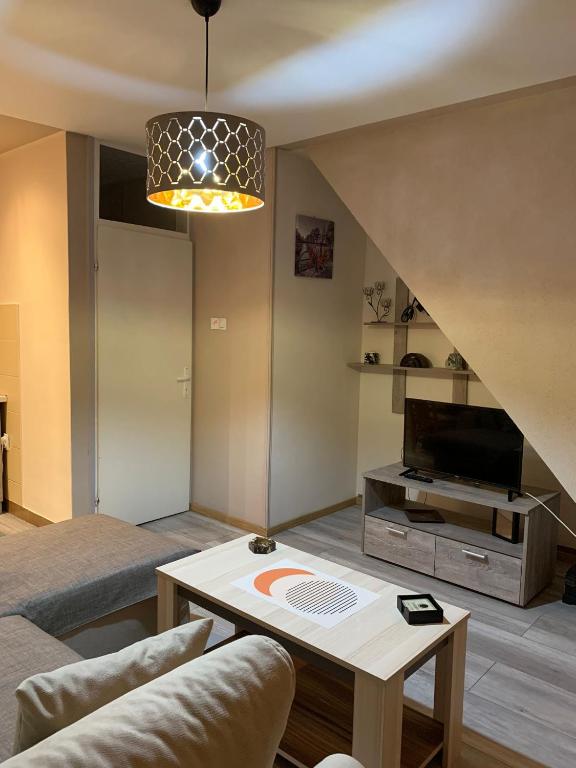 Posezení v ubytování Square Apartment