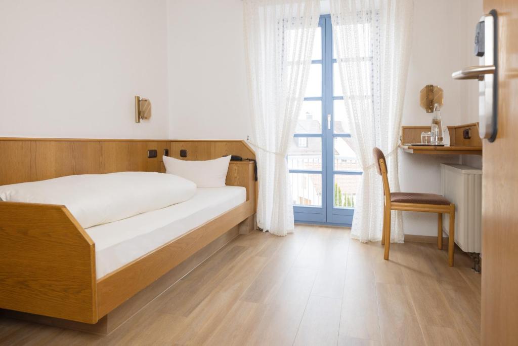 Postel nebo postele na pokoji v ubytování AKZENT Hotel Meerfräulein