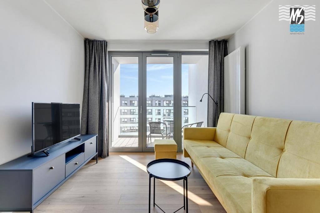 Televízia a/alebo spoločenská miestnosť v ubytovaní Ms Apartments Top Center VIII