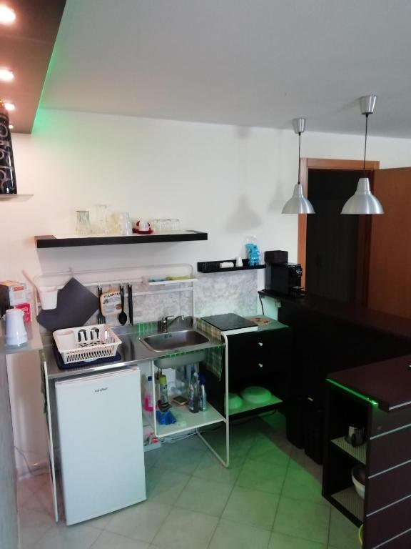 Kuchyň nebo kuchyňský kout v ubytování Marlen's House