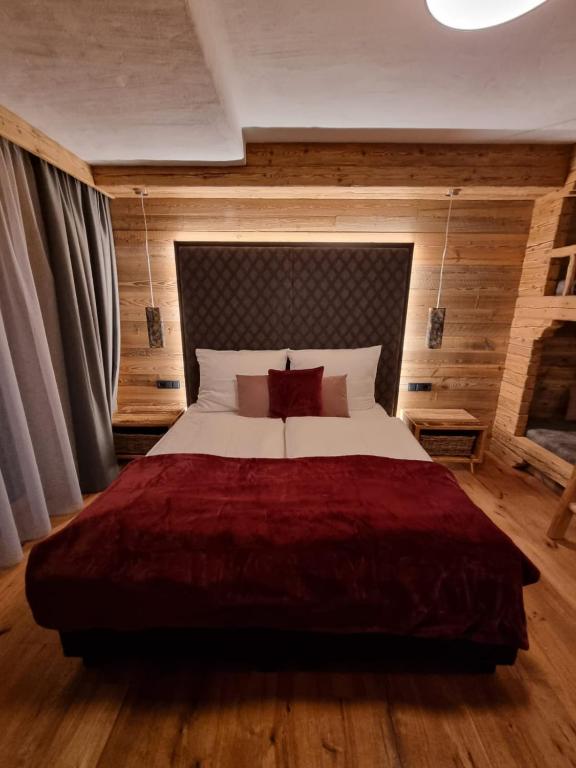 Postel nebo postele na pokoji v ubytování Panorama Berg Chalet