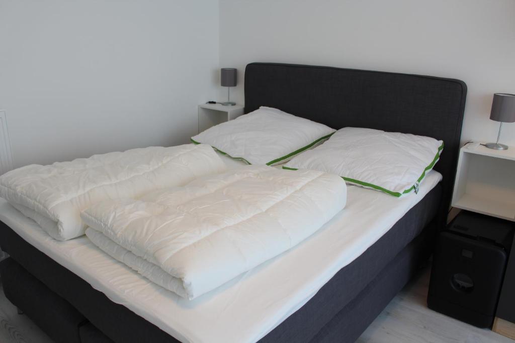 Postel nebo postele na pokoji v ubytování Mimi's Ostseeglück