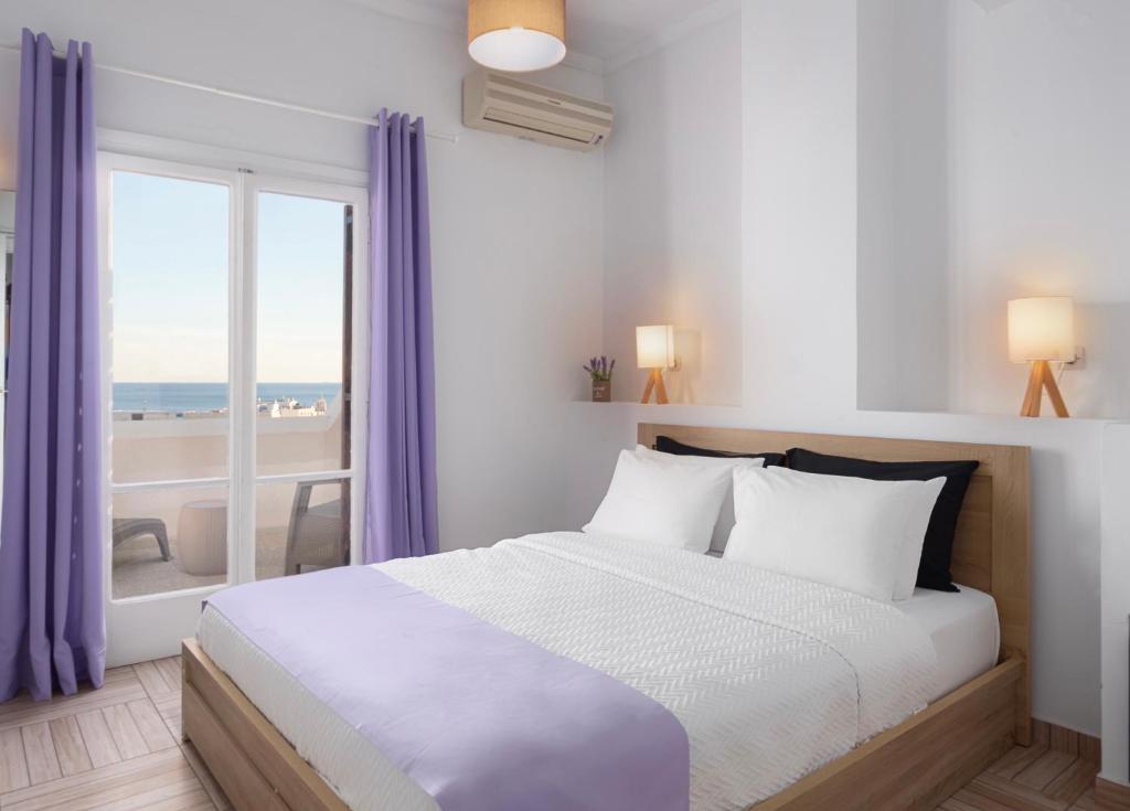 Postel nebo postele na pokoji v ubytování Venus Minimal Hotel