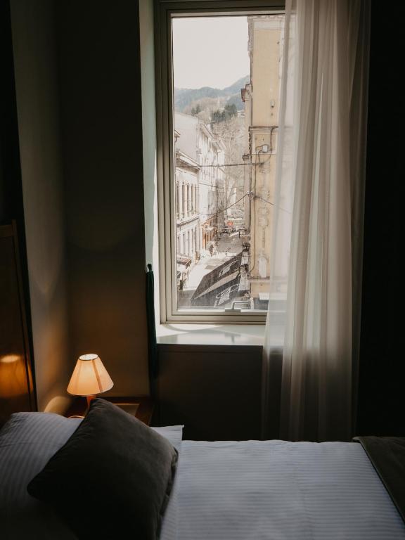 Postel nebo postele na pokoji v ubytování Hotel Astra