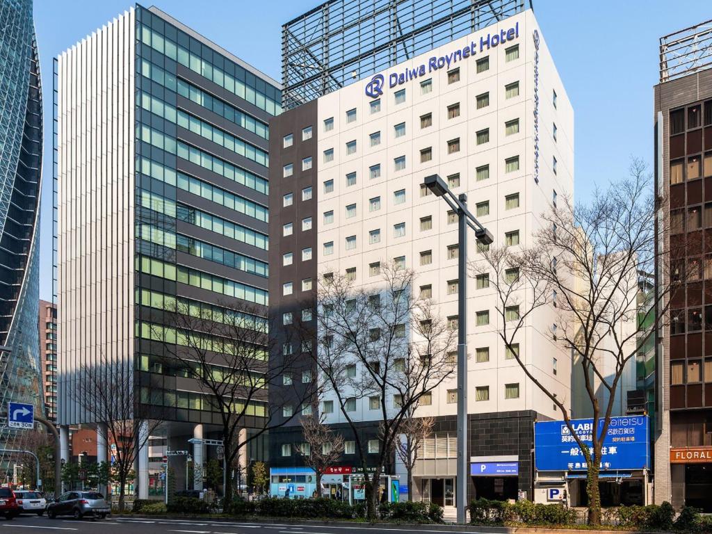 a building with the samsung company logo on it at Daiwa Roynet Hotel Nagoya Eki Mae in Nagoya