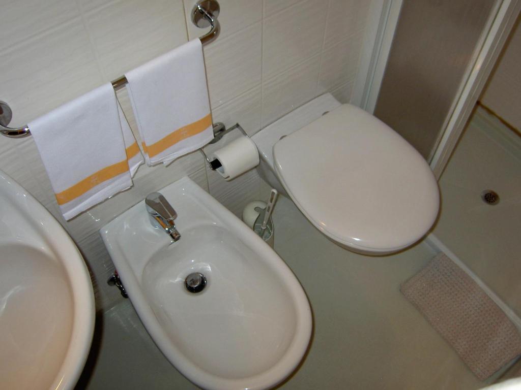 Koupelna v ubytování Hotel Violetta