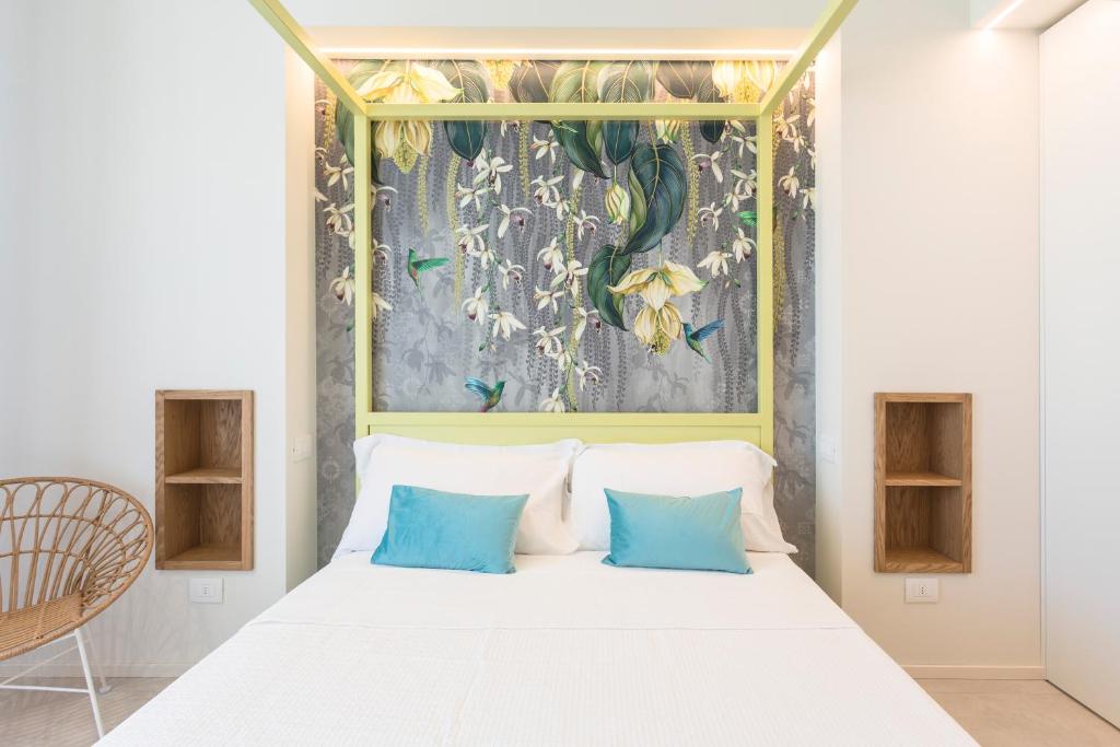 A bed or beds in a room at Hotel Alexandra - Beach Front - Healthy XXL Breakfast & Brunch until 12 30 - parking included