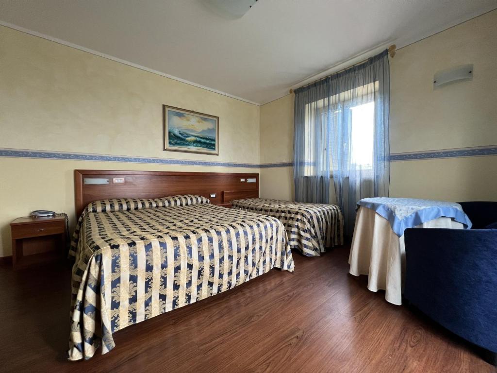Postel nebo postele na pokoji v ubytování Viole Country Hotel