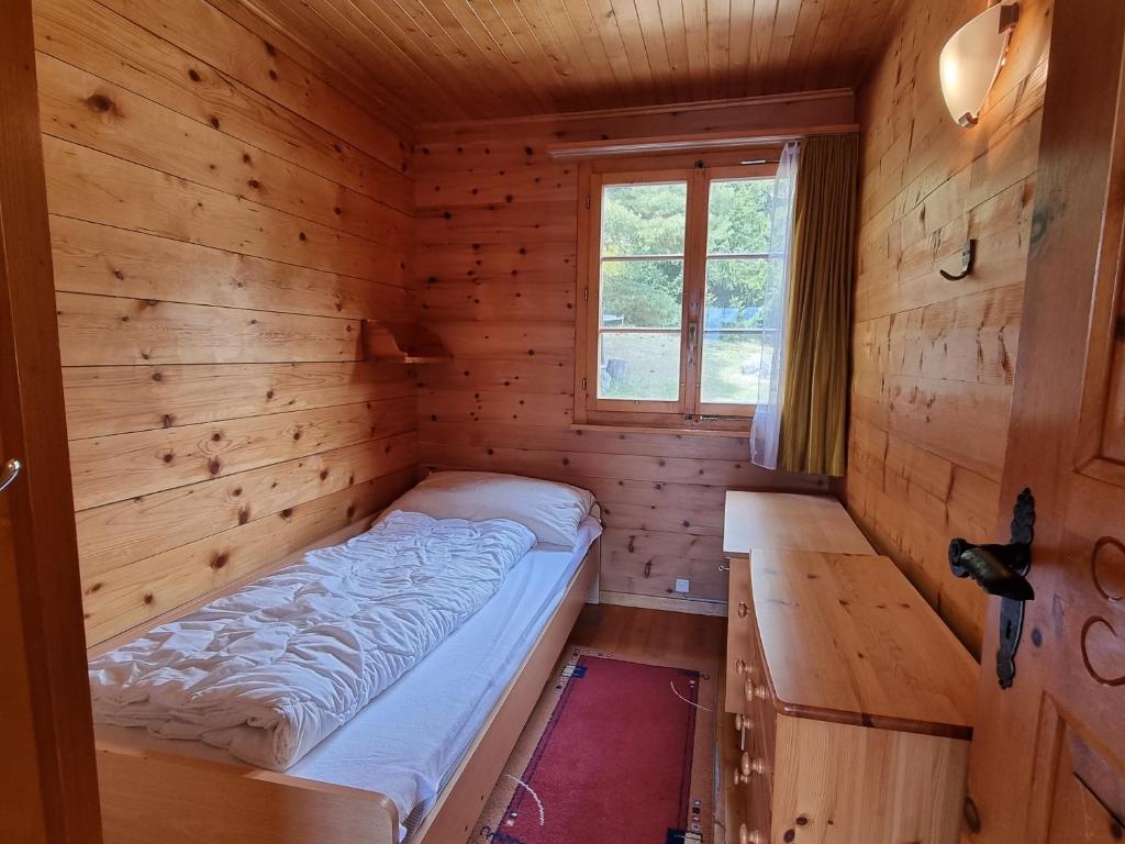 Postel nebo postele na pokoji v ubytování Zer Tanna